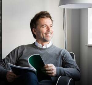 Man Reading Magazine
